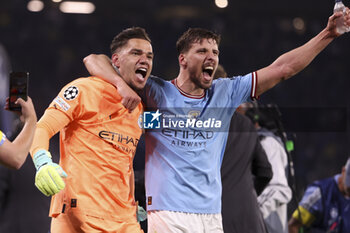 2023-06-10 - Manchester City goalkeeper Ederson Moraes and Ruben Dias celebrate following the UEFA Champions League, Final football match between Manchester City FC and FC Internazionale (Inter Milan) on June 10, 2023 at Ataturk Olympic Stadium in Istanbul, Turkey - FOOTBALL - CHAMPIONS LEAGUE - FINAL - MANCHESTER CITY V INTERNAZIONALE - UEFA CHAMPIONS LEAGUE - SOCCER