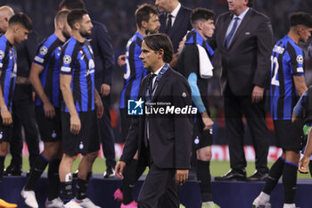 2023-06-10 - Coach of Inter Milan Simone Inzaghi looks dejected during the trophy ceremony following the UEFA Champions League, Final football match between Manchester City FC and FC Internazionale (Inter Milan) on June 10, 2023 at Ataturk Olympic Stadium in Istanbul, Turkey - FOOTBALL - CHAMPIONS LEAGUE - FINAL - MANCHESTER CITY V INTERNAZIONALE - UEFA CHAMPIONS LEAGUE - SOCCER
