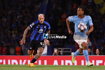 2023-06-10 - Nathan Ake of Manchester City, Federico DiMarco of Inter Milan (left) during the UEFA Champions League, Final football match between Manchester City FC and FC Internazionale on June 10, 2023 at Ataturk Olympic Stadium in Istanbul, Turkey - FOOTBALL - CHAMPIONS LEAGUE - FINAL - MANCHESTER CITY V INTERNAZIONALE - UEFA CHAMPIONS LEAGUE - SOCCER