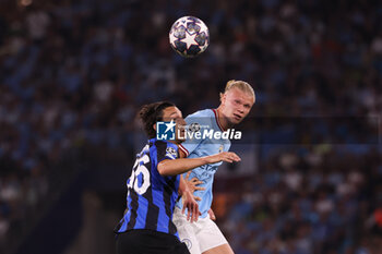2023-06-10 - Erling Haaland of Manchester City, Mattia Zanotti of Inter Milan (left) during the UEFA Champions League, Final football match between Manchester City FC and FC Internazionale on June 10, 2023 at Ataturk Olympic Stadium in Istanbul, Turkey - FOOTBALL - CHAMPIONS LEAGUE - FINAL - MANCHESTER CITY V INTERNAZIONALE - UEFA CHAMPIONS LEAGUE - SOCCER