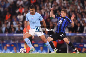 2023-06-10 - Rodrigo Hernandez Cascante aka Rodri of Manchester City, Nicolo Barella of Inter Milan during the UEFA Champions League, Final football match between Manchester City FC and FC Internazionale on June 10, 2023 at Ataturk Olympic Stadium in Istanbul, Turkey - FOOTBALL - CHAMPIONS LEAGUE - FINAL - MANCHESTER CITY V INTERNAZIONALE - UEFA CHAMPIONS LEAGUE - SOCCER