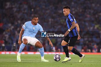 2023-06-10 - Lautaro Martinez of Inter Milan, Manuel Akanji of Manchester City (left) during the UEFA Champions League, Final football match between Manchester City FC and FC Internazionale on June 10, 2023 at Ataturk Olympic Stadium in Istanbul, Turkey - FOOTBALL - CHAMPIONS LEAGUE - FINAL - MANCHESTER CITY V INTERNAZIONALE - UEFA CHAMPIONS LEAGUE - SOCCER