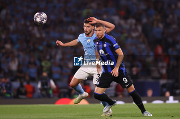 2023-06-10 - Ruben Dias of Manchester City, Edin Dzeko of Inter Milan during the UEFA Champions League, Final football match between Manchester City FC and FC Internazionale on June 10, 2023 at Ataturk Olympic Stadium in Istanbul, Turkey - FOOTBALL - CHAMPIONS LEAGUE - FINAL - MANCHESTER CITY V INTERNAZIONALE - UEFA CHAMPIONS LEAGUE - SOCCER