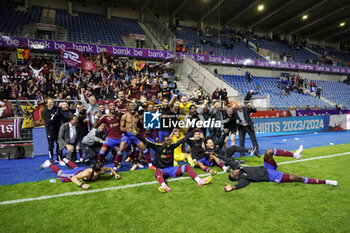 2023-08-02 - Players of Servette FC celebrating after winning the penalty shootout during the UEFA Champions League, Second qualifying round, 2nd leg football match between KRC Genk and Servette FC on August 2, 2023 at the Cegeka Arena in Genk, Belgium - FOOTBALL - CHAMPIONS LEAGUE - KRC GENK V SERVETTE FC - UEFA CHAMPIONS LEAGUE - SOCCER