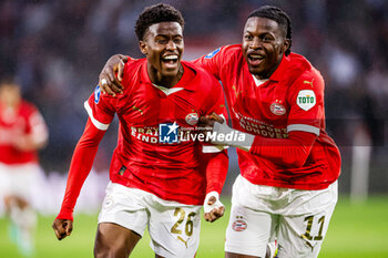 2023-08-08 - Isaac Babadi of PSV celebrates after scoring his teams first goal, Johan Bakayoko of PSV during the UEFA Champions League, Third qualifying round, 1st leg football match between PSV and SK Sturm Graz on August 8, 2023 at Philips Stadion in Eindhoven, Netherlands - FOOTBALL - CHAMPIONS LEAGUE - PSV V STURM GRAZ - UEFA CHAMPIONS LEAGUE - SOCCER