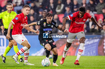 2023-08-08 - Joey Veerman of PSV, Otari Kiteishvili of Sturm Graz, Ibrahim Sangare of PSV during the UEFA Champions League, Third qualifying round, 1st leg football match between PSV and SK Sturm Graz on August 8, 2023 at Philips Stadion in Eindhoven, Netherlands - FOOTBALL - CHAMPIONS LEAGUE - PSV V STURM GRAZ - UEFA CHAMPIONS LEAGUE - SOCCER