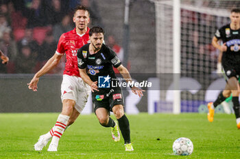2023-08-08 - Luuk de Jong of PSV battles for possession with Willian Boving of Sturm Graz during the UEFA Champions League, Third qualifying round, 1st leg football match between PSV and SK Sturm Graz on August 8, 2023 at Philips Stadion in Eindhoven, Netherlands - FOOTBALL - CHAMPIONS LEAGUE - PSV V STURM GRAZ - UEFA CHAMPIONS LEAGUE - SOCCER
