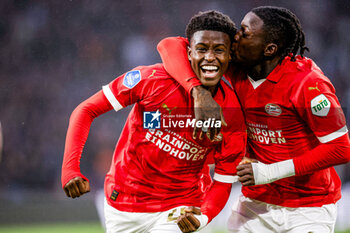 2023-08-08 - Isaac Babadi of PSV celebrates after scoring his teams first goal, Johan Bakayoko of PSV during the UEFA Champions League, Third qualifying round, 1st leg football match between PSV and SK Sturm Graz on August 8, 2023 at Philips Stadion in Eindhoven, Netherlands - FOOTBALL - CHAMPIONS LEAGUE - PSV V STURM GRAZ - UEFA CHAMPIONS LEAGUE - SOCCER