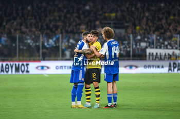 2023-08-19 - 12 Lazaros Rota of AEK FC with 7 Luka Ivanusec of GNK Dinamo Zagreb during the UEFA Champions League, 3rd Qualification Round match between AEK FC and GNK Dinamo Zagreb at Opap Arena on August 19, 2023, in Athens, Greece. - AEK-DINAMO ZAGREB 3RD QUALIFICATION ROUND - UEFA CHAMPIONS LEAGUE - SOCCER