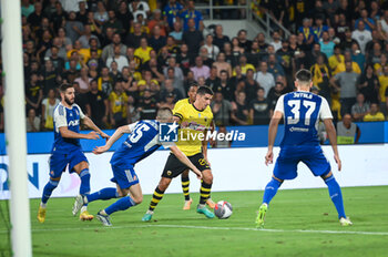 2023-08-19 - 20 Petros Mantalos of AEK FC competing with 15 Bogdan Mykhaylichenko of GNK Dinamo Zagreb during the UEFA Champions League, 3rd Qualification Round match between AEK FC and GNK Dinamo Zagreb at Opap Arena on August 19, 2023, in Athens, Greece. - AEK-DINAMO ZAGREB 3RD QUALIFICATION ROUND - UEFA CHAMPIONS LEAGUE - SOCCER