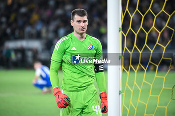 2023-08-19 - 40 Dominik Livakovic of GNK Dinamo Zagreb disappointed after a goal conceded during the UEFA Champions League, 3rd Qualification Round match between AEK FC and GNK Dinamo Zagreb at Opap Arena on August 19, 2023, in Athens, Greece. - AEK-DINAMO ZAGREB 3RD QUALIFICATION ROUND - UEFA CHAMPIONS LEAGUE - SOCCER