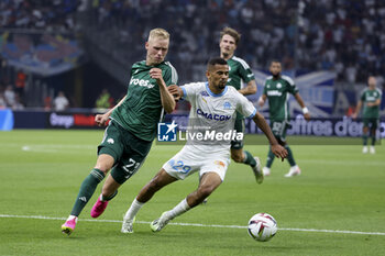 2023-08-16 - Iliman Ndiaye of Marseille, left Hordur Magnusson of Panathinaikos during the UEFA Champions League, Third qualifying round, 2nd leg football match between Olympique de Marseille (OM) and Panathinaikos FC (Pana) on August 15, 2023 at Velodrome stadium in Marseille, France - FOOTBALL - CHAMPIONS LEAGUE - MARSEILLE V PANATHINAIKOS - UEFA CHAMPIONS LEAGUE - SOCCER