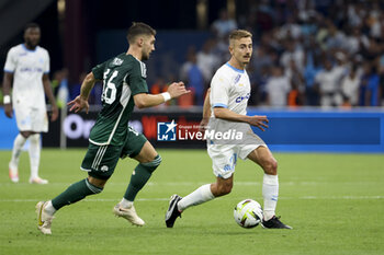 2023-08-16 - Valentin Rongier of Marseille, left Adam Gnezda Cerin of Panathinaikos during the UEFA Champions League, Third qualifying round, 2nd leg football match between Olympique de Marseille (OM) and Panathinaikos FC (Pana) on August 15, 2023 at Velodrome stadium in Marseille, France - FOOTBALL - CHAMPIONS LEAGUE - MARSEILLE V PANATHINAIKOS - UEFA CHAMPIONS LEAGUE - SOCCER