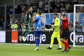 2023-08-16 - Ruben Perez, Panathinaikos goalkeeper Alberto Brignoli celebrate the victory after the penalty shootout of the UEFA Champions League, Third qualifying round, 2nd leg football match between Olympique de Marseille (OM) and Panathinaikos FC (Pana) on August 15, 2023 at Velodrome stadium in Marseille, France - FOOTBALL - CHAMPIONS LEAGUE - MARSEILLE V PANATHINAIKOS - UEFA CHAMPIONS LEAGUE - SOCCER