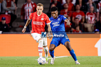 2023-08-30 - Noa Lang of PSV, Jose Cifuentes of Rangers during the UEFA Champions League, Play-offs, 2nd leg football match between PSV and Rangers on August 30, 2023 at the Philips Stadion in Eindhoven, Netherlands - FOOTBALL - CHAMPIONS LEAGUE - PSV V RANGERS - UEFA CHAMPIONS LEAGUE - SOCCER