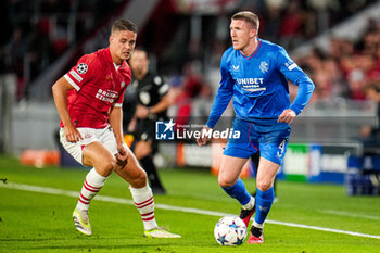 2023-08-30 - Joey Veerman of PSV and John Lundstram of Rangers during the UEFA Champions League, Play-offs, 2nd leg football match between PSV and Rangers on August 30, 2023 at the Philips Stadion in Eindhoven, Netherlands - FOOTBALL - CHAMPIONS LEAGUE - PSV V RANGERS - UEFA CHAMPIONS LEAGUE - SOCCER