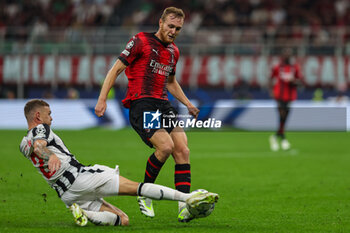 2023-09-19 - Tommaso Pobega of AC Milan competes for the ball with Kieran Trppier of Newcastle United FC during UEFA Champions League 2023/24 Group Stage - Group F football match between AC Milan and Newcastle United FC at San Siro Stadium, Milan, Italy on September 19, 2023 - AC MILAN VS NEWCASTLE UNITED FC - UEFA CHAMPIONS LEAGUE - SOCCER