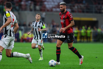 2023-09-19 - Olivier Giroud of AC Milan seen in action during UEFA Champions League 2023/24 Group Stage - Group F football match between AC Milan and Newcastle United FC at San Siro Stadium, Milan, Italy on September 19, 2023 - AC MILAN VS NEWCASTLE UNITED FC - UEFA CHAMPIONS LEAGUE - SOCCER