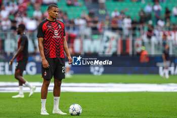 2023-09-19 - Malick Thiaw of AC Milan warms up during UEFA Champions League 2023/24 Group Stage - Group F football match between AC Milan and Newcastle United FC at San Siro Stadium, Milan, Italy on September 19, 2023 - AC MILAN VS NEWCASTLE UNITED FC - UEFA CHAMPIONS LEAGUE - SOCCER