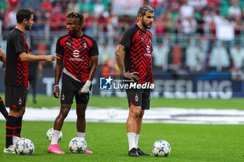 2023-09-19 - Theo Hernandez of AC Milan warms up during UEFA Champions League 2023/24 Group Stage - Group F football match between AC Milan and Newcastle United FC at San Siro Stadium, Milan, Italy on September 19, 2023 - AC MILAN VS NEWCASTLE UNITED FC - UEFA CHAMPIONS LEAGUE - SOCCER