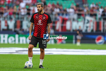 2023-09-19 - Theo Hernandez of AC Milan warms up during UEFA Champions League 2023/24 Group Stage - Group F football match between AC Milan and Newcastle United FC at San Siro Stadium, Milan, Italy on September 19, 2023 - AC MILAN VS NEWCASTLE UNITED FC - UEFA CHAMPIONS LEAGUE - SOCCER