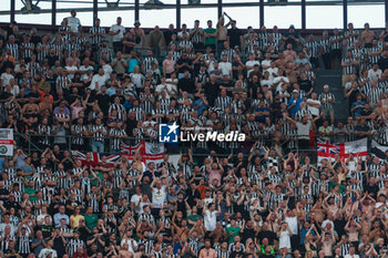 2023-09-19 - Newcastle United FC supporters during UEFA Champions League 2023/24 Group Stage - Group F football match between AC Milan and Newcastle United FC at San Siro Stadium, Milan, Italy on September 19, 2023 - AC MILAN VS NEWCASTLE UNITED FC - UEFA CHAMPIONS LEAGUE - SOCCER
