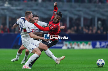 2023-11-07 - Rafael Leao of AC Milan competes for the ball with Milan Skriniar of Paris Saint-Germain FC during UEFA Champions League 2023/24 Group Stage - Group F football match between AC Milan and Paris Saint-Germain FC at San Siro Stadium, Milan, Italy on November 07, 2023 - AC MILAN VS PARIS SAINT-GERMAIN - UEFA CHAMPIONS LEAGUE - SOCCER