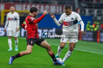 2023-11-07 - Kylian Mbappe of Paris Saint-Germain FC competes for the ball with Davide Calabria of AC Milan during UEFA Champions League 2023/24 Group Stage - Group F football match between AC Milan and Paris Saint-Germain FC at San Siro Stadium, Milan, Italy on November 07, 2023 - AC MILAN VS PARIS SAINT-GERMAIN - UEFA CHAMPIONS LEAGUE - SOCCER