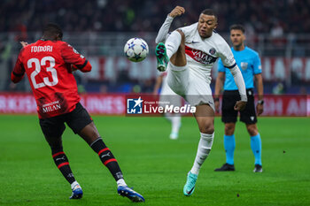 2023-11-07 - Kylian Mbappe of Paris Saint-Germain FC competes for the ball with Fikayo Tomori of AC Milan during UEFA Champions League 2023/24 Group Stage - Group F football match between AC Milan and Paris Saint-Germain FC at San Siro Stadium, Milan, Italy on November 07, 2023 - AC MILAN VS PARIS SAINT-GERMAIN - UEFA CHAMPIONS LEAGUE - SOCCER