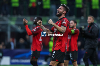 2023-11-07 - Olivier Giroud of AC Milan celebrates the victory at the end of the match during UEFA Champions League 2023/24 Group Stage - Group F football match between AC Milan and Paris Saint-Germain FC at San Siro Stadium, Milan, Italy on November 07, 2023 - AC MILAN VS PARIS SAINT-GERMAIN - UEFA CHAMPIONS LEAGUE - SOCCER