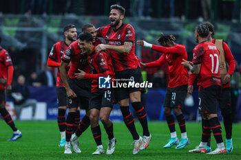 2023-11-07 - Olivier Giroud of AC Milan celebrates the victory at the end of the match with AC Milan players during UEFA Champions League 2023/24 Group Stage - Group F football match between AC Milan and Paris Saint-Germain FC at San Siro Stadium, Milan, Italy on November 07, 2023 - AC MILAN VS PARIS SAINT-GERMAIN - UEFA CHAMPIONS LEAGUE - SOCCER