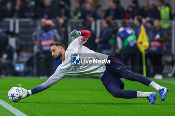 2023-11-07 - Gianluigi Donnarumma of Paris Saint-Germain FC warms up during UEFA Champions League 2023/24 Group Stage - Group F football match between AC Milan and Paris Saint-Germain FC at San Siro Stadium, Milan, Italy on November 07, 2023 - AC MILAN VS PARIS SAINT-GERMAIN - UEFA CHAMPIONS LEAGUE - SOCCER