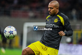 2023-11-28 - Donyell Malen of Borussia Dortmund warms up during UEFA Champions League 2023/24 Group Stage - Group F football match between AC Milan and Borussia Dortmund at San Siro Stadium, Milan, Italy on November 28, 2023 - AC MILAN VS BORUSSIA DORTMUND - UEFA CHAMPIONS LEAGUE - SOCCER