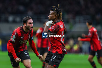 2023-11-28 - Samuel Chukwueze of AC Milan celebrates after scoring a goal with Davide Calabria of AC Milan during UEFA Champions League 2023/24 Group Stage - Group F football match between AC Milan and Borussia Dortmund at San Siro Stadium, Milan, Italy on November 28, 2023 - AC MILAN VS BORUSSIA DORTMUND - UEFA CHAMPIONS LEAGUE - SOCCER