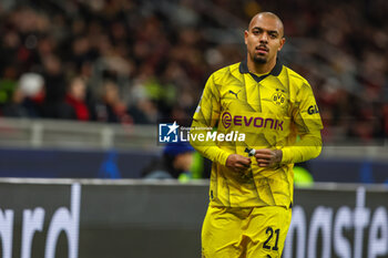 2023-11-28 - Donyell Malen of Borussia Dortmund looks on during UEFA Champions League 2023/24 Group Stage - Group F football match between AC Milan and Borussia Dortmund at San Siro Stadium, Milan, Italy on November 28, 2023 - AC MILAN VS BORUSSIA DORTMUND - UEFA CHAMPIONS LEAGUE - SOCCER