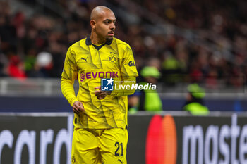 2023-11-28 - Donyell Malen of Borussia Dortmund looks on during UEFA Champions League 2023/24 Group Stage - Group F football match between AC Milan and Borussia Dortmund at San Siro Stadium, Milan, Italy on November 28, 2023 - AC MILAN VS BORUSSIA DORTMUND - UEFA CHAMPIONS LEAGUE - SOCCER