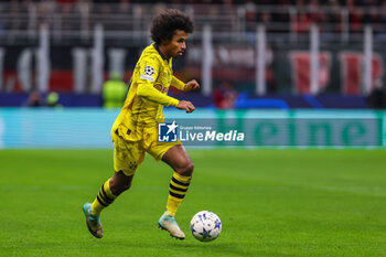 2023-11-28 - Karim Adeyemi of Borussia Dortmund seen in action during UEFA Champions League 2023/24 Group Stage - Group F football match between AC Milan and Borussia Dortmund at San Siro Stadium, Milan, Italy on November 28, 2023 - AC MILAN VS BORUSSIA DORTMUND - UEFA CHAMPIONS LEAGUE - SOCCER