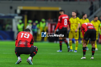 2023-11-28 - Theo Hernandez of AC Milan reacts at the end of the match during UEFA Champions League 2023/24 Group Stage - Group F football match between AC Milan and Borussia Dortmund at San Siro Stadium, Milan, Italy on November 28, 2023 - AC MILAN VS BORUSSIA DORTMUND - UEFA CHAMPIONS LEAGUE - SOCCER