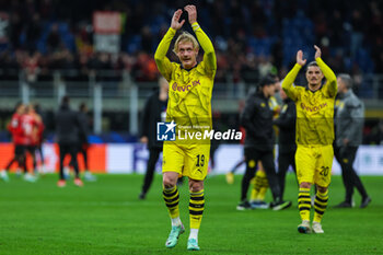 2023-11-28 - Julian Brandt of Borussia Dortmund celebrates the victory at the end of the match during UEFA Champions League 2023/24 Group Stage - Group F football match between AC Milan and Borussia Dortmund at San Siro Stadium, Milan, Italy on November 28, 2023 - AC MILAN VS BORUSSIA DORTMUND - UEFA CHAMPIONS LEAGUE - SOCCER