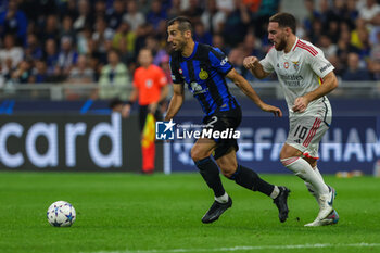 2023-10-03 - Henrikh Mkhitaryan of FC Internazionale competes for the ball with Orkun Kokcu of SL Benfica during the UEFA Champions League 2023/24 Group Stage - Group D football match between FC Internazionale and SL Benfica at Giuseppe Meazza Stadium, Milan, Italy on October 03, 2023 - INTER - FC INTERNAZIONALE VS SL BENFICA - UEFA CHAMPIONS LEAGUE - SOCCER