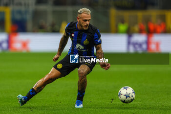 2023-10-03 - Federico Dimarco of FC Internazionale seen in action during the UEFA Champions League 2023/24 Group Stage - Group D football match between FC Internazionale and SL Benfica at Giuseppe Meazza Stadium, Milan, Italy on October 03, 2023 - INTER - FC INTERNAZIONALE VS SL BENFICA - UEFA CHAMPIONS LEAGUE - SOCCER