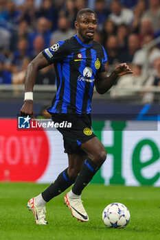 2023-10-03 - Marcus Thuram of FC Internazionale seen in action during the UEFA Champions League 2023/24 Group Stage - Group D football match between FC Internazionale and SL Benfica at Giuseppe Meazza Stadium, Milan, Italy on October 03, 2023 - INTER - FC INTERNAZIONALE VS SL BENFICA - UEFA CHAMPIONS LEAGUE - SOCCER