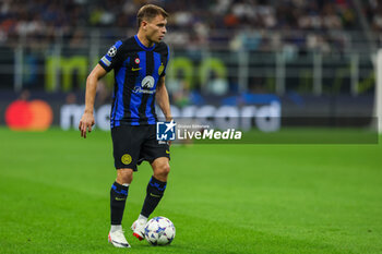 2023-10-03 - Nicolo Barella of FC Internazionale seen in action during the UEFA Champions League 2023/24 Group Stage - Group D football match between FC Internazionale and SL Benfica at Giuseppe Meazza Stadium, Milan, Italy on October 03, 2023 - INTER - FC INTERNAZIONALE VS SL BENFICA - UEFA CHAMPIONS LEAGUE - SOCCER