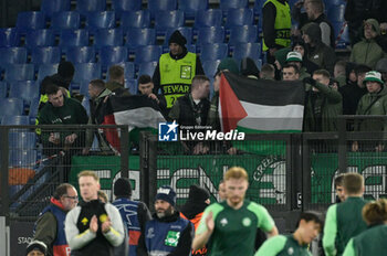 2023-11-28 - Celtic supporters with the Palestinian flag during the UEFA Champions League 2023-2024 football match between SS Lazio and Celtic FC at the Olympic Stadium in Rome on November 28, 2023. - SS LAZIO VS CELTIC FC - UEFA CHAMPIONS LEAGUE - SOCCER