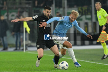 2023-11-28 - Greg Taylor (Celtic FC); Gustav Isaksen (SS Lazio);  during the UEFA Champions League 2023-2024 football match between SS Lazio and Celtic FC at the Olympic Stadium in Rome on November 28, 2023. - SS LAZIO VS CELTIC FC - UEFA CHAMPIONS LEAGUE - SOCCER