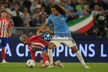 2023-09-19 - Matteo Guendouzi (SS Lazio); Antoine Griezmann (Club Atletico de Madrid);  during the UEFA Champions League 2023-2024 football match between SS Lazio and Atletico Madrid at the Olympic Stadium in Rome on September 19, 2023. - SS LAZIO VS CLUB ATLETICO DE MADRID - UEFA CHAMPIONS LEAGUE - SOCCER