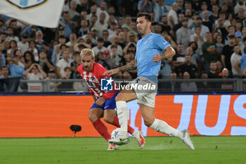 2023-09-19 - Antoine Griezmann (Club Atletico de Madrid); Alessio Romagnoli (SS Lazio);  during the UEFA Champions League 2023-2024 football match between SS Lazio and Atletico Madrid at the Olympic Stadium in Rome on September 19, 2023. - SS LAZIO VS CLUB ATLETICO DE MADRID - UEFA CHAMPIONS LEAGUE - SOCCER
