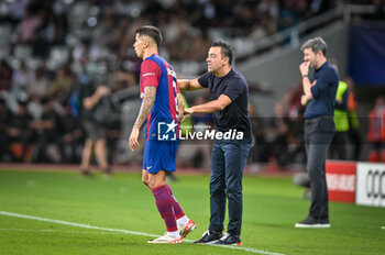 2023-09-19 - Head Coach Xavi Hernandez (FC Barcelona) and Joao Cancelo (FC Barcelona) gestures during a UEFA Champions League first match between FC Barcelona and Royal Antwerp at Estadi Olimpic Lluis Companys, in Barcelona, ,Spain on September 19, 2023. (Photo / Felipe Mondino) - FC BARCELONA - ROYAL ANTWERP - UEFA CHAMPIONS LEAGUE - SOCCER