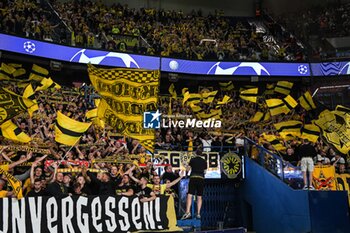 2023-09-19 - Supporters of Borussia Dortmund during the UEFA Champions League, Group F football match between Paris Saint Germain and Borussia Dortmund on September 19, 2023 at Parc des Princes stadium in Paris, France - FOOTBALL - UEFA CHAMPIONS LEAGUE - PARIS SG V BORUSSIA DORTMUND - UEFA CHAMPIONS LEAGUE - SOCCER