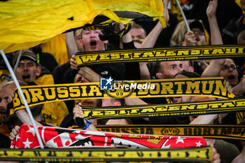 2023-09-19 - Supporters of Borussia Dortmund during the UEFA Champions League, Group F football match between Paris Saint Germain and Borussia Dortmund on September 19, 2023 at Parc des Princes stadium in Paris, France - FOOTBALL - UEFA CHAMPIONS LEAGUE - PARIS SG V BORUSSIA DORTMUND - UEFA CHAMPIONS LEAGUE - SOCCER